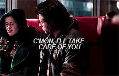 Live action Wolverine hugging Rogue in a train